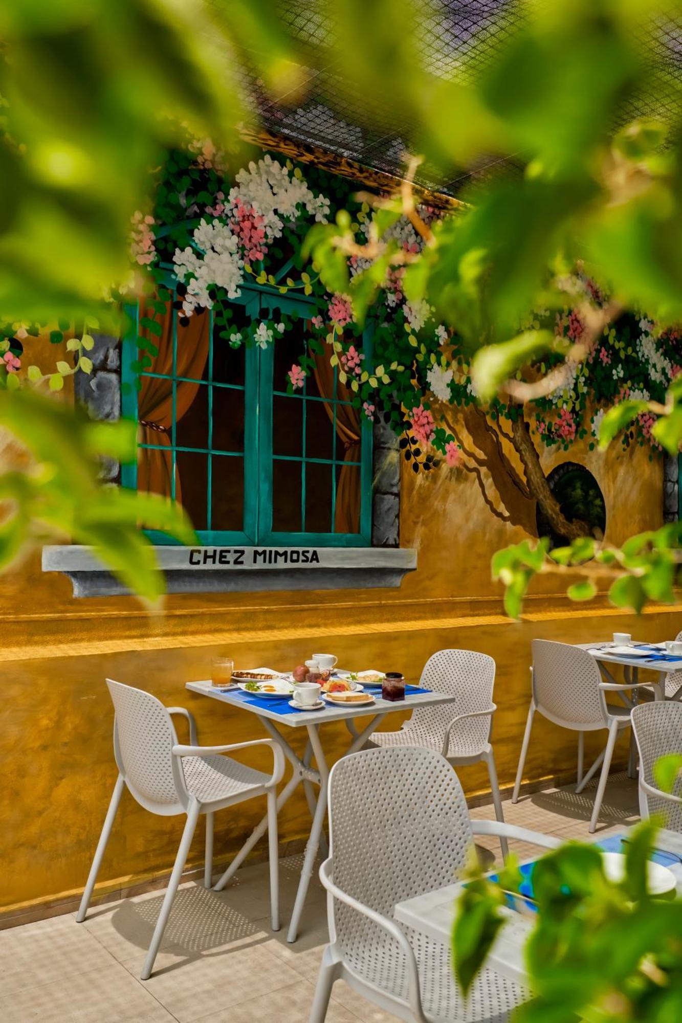 Bed and Breakfast Chez Mimosa Хошимин Экстерьер фото